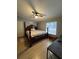 Cozy main bedroom with a queen bed, ceiling fan, and ample natural light at 291 Folsom Glade Rd, Rydal, GA 30171