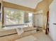 Bright bathroom featuring a soaking tub and a separate shower at 345 Oakwind Pt, Acworth, GA 30101