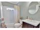Bright bathroom featuring a modern vanity, neutral wall color and shower-tub combo at 345 Oakwind Pt, Acworth, GA 30101