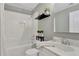 Bathroom features a shower/tub combo, white subway tiles, and a stylish vanity at 345 Oakwind Pt, Acworth, GA 30101