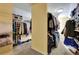 Large walk-in closet with ample storage and organization for shoes and clothes at 345 Oakwind Pt, Acworth, GA 30101