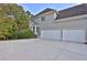 Spacious three-car garage attached to the beautiful home at 345 Oakwind Pt, Acworth, GA 30101