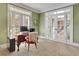 Home office area featuring carpet, light walls, and a large window at 345 Oakwind Pt, Acworth, GA 30101