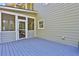 Covered patio with access to the screened-in porch and backyard at 345 Oakwind Pt, Acworth, GA 30101