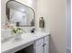 Bathroom vanity with marble countertops and modern fixtures at 927 Abbey Park Way, Lawrenceville, GA 30044