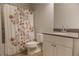 Bathroom featuring a floral shower curtain and a modern vanity at 2256 Cadenza Cir, Dacula, GA 30019