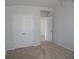 A carpeted bedroom includes a closet and a door to the hall at 2256 Cadenza Cir, Dacula, GA 30019