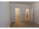 Bedroom showcasing walk-in closet and adjacent shelving closet at 2256 Cadenza Cir, Dacula, GA 30019