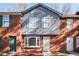 Charming townhome featuring a mix of brick and gray siding with a covered entry at 669 Hunting Creek Se Ln, Conyers, GA 30013