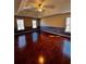 Expansive bedroom boasts hardwood floors, a vaulted ceiling, and natural light at 136 Hunters Ct, Dallas, GA 30157