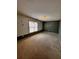 Spacious bedroom featuring carpet flooring, a window, and neutral wall colors at 136 Hunters Ct, Dallas, GA 30157