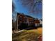 Charming two-story brick home with a well-manicured lawn and a two-car garage at 136 Hunters Ct, Dallas, GA 30157