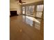 Inviting living room with tile flooring, a fireplace, and large windows offering plenty of natural light at 136 Hunters Ct, Dallas, GA 30157