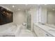 Beautiful bathroom featuring marble floors and a soaking tub and walk-in shower at 17 Blackland Rd, Atlanta, GA 30342