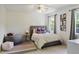 Cozy bedroom featuring playful decor, a queen-sized bed, and natural light at 17 Blackland Rd, Atlanta, GA 30342
