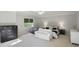 Bright bedroom features neutral decor, a comfy sitting area, and abundant natural light at 17 Blackland Rd, Atlanta, GA 30342