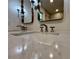 Upscale bathroom boasting a double sink vanity with quartz countertop, framed mirrors, and modern stainless steel faucets at 3629 Stewart Rd, Atlanta, GA 30340