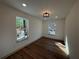 Bedroom featuring hardwood floors and plenty of natural light at 3629 Stewart Rd, Atlanta, GA 30340
