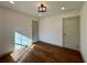 Cozy bedroom featuring hardwood floors and lots of natural light at 3629 Stewart Rd, Atlanta, GA 30340