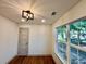Inviting bedroom with natural light, complemented by a modern light fixture at 3629 Stewart Rd, Atlanta, GA 30340