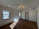 Inviting bedroom with hardwood floors, natural light streaming through the windows, and recessed lighting at 3629 Stewart Rd, Atlanta, GA 30340