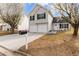 Charming two-story home with a well-manicured lawn, complemented by trees and a convenient mailbox at 4314 Ward Bluff Ct, Ellenwood, GA 30294