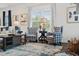 Comfortable living room features blue and white armchairs and decorative accents at 525 Lanier Way, Temple, GA 30179