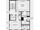 Third floor features primary suite, laundry room, and additional bedroom at 5724 Schelton Se Pl, Mableton, GA 30126
