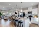 Modern open kitchen featuring a large island and stainless steel appliances at 5724 Schelton Se Pl, Mableton, GA 30126