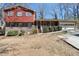 Inviting two-story home boasts mature landscaping, traditional windows, and an attached garage at 6067 Dana Dr, Norcross, GA 30093