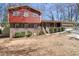 Charming two-story home featuring a brick foundation, traditional windows, and attached garage at 6067 Dana Dr, Norcross, GA 30093