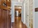 Inviting foyer featuring hardwood floors, direct view into the kitchen, and french doors at 6067 Dana Dr, Norcross, GA 30093