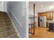 Open-concept kitchen with wood cabinets, stainless steel appliances, and a unique tiled island at 6067 Dana Dr, Norcross, GA 30093