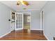Inviting living room featuring hardwood floors and a glass-paneled door leading to another room at 6067 Dana Dr, Norcross, GA 30093