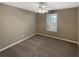Simple bedroom with neutral carpet and a bright window at 21 Fortson Dr, Hampton, GA 30228