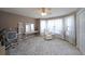 Cozy bedroom with natural light, a ceiling fan, and a decorative rug. Perfect for relaxation at 3114 Superior Dr, Dacula, GA 30019