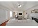 Spacious living room with tray ceiling, fireplace, and neutral decor for versatile styling at 3114 Superior Dr, Dacula, GA 30019