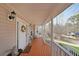 Cozy covered front porch with seating area and a charming view of the neighborhood at 3114 Superior Dr, Dacula, GA 30019