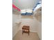 A well-organized walk-in closet with shelving and a small table for added convenience at 3114 Superior Dr, Dacula, GA 30019
