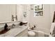 Stylish bathroom showcasing a marble vanity, subway tiles, and a relaxing soaking tub with modern fixtures at 435 10Th Ne St # 18, Atlanta, GA 30309