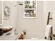 Elegant bathroom featuring a soaking tub, natural light, and modern fixtures for a spa-like experience at 435 10Th Ne St # 18, Atlanta, GA 30309