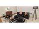 Cozy living room featuring a stylish sofa, unique chairs, and hardwood floors at 435 10Th Ne St # 18, Atlanta, GA 30309