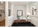 Stylish home office featuring a glass desk, modern decor, and ample natural light at 435 10Th Ne St # 18, Atlanta, GA 30309