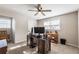 Bedroom featuring a ceiling fan and natural light, providing a serene atmosphere at 504 Hanover Ct, Woodstock, GA 30188