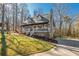 Charming two-story home features a welcoming front porch, fresh exterior paint, and a well-manicured front yard at 504 Hanover Ct, Woodstock, GA 30188