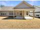 A spacious backyard with a covered patio, perfect for outdoor entertaining at 272 Laurel Canyon Pkwy, Canton, GA 30114