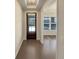 Welcoming entryway with hardwood floors and a view to the adjoining dining area at 272 Laurel Canyon Pkwy, Canton, GA 30114