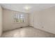 Neutral bedroom featuring a window with natural light and tile flooring at 4693 Sugar Hill Se Rd, Acworth, GA 30102