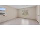 Bedroom with a window and light colored flooring at 4693 Sugar Hill Se Rd, Acworth, GA 30102