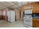 View of the kitchen featuring a white refrigerator and oven at 4693 Sugar Hill Se Rd, Acworth, GA 30102